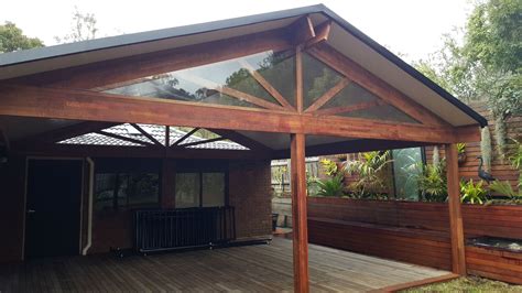 insulated gable roof merbau frame verandah backyard patio designs rustic patio hot tub pergola