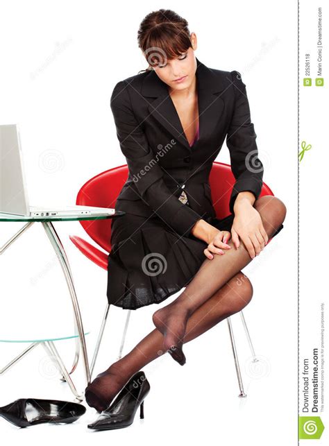 Business Woman Relaxing Her Leg With Massage Royalty Free