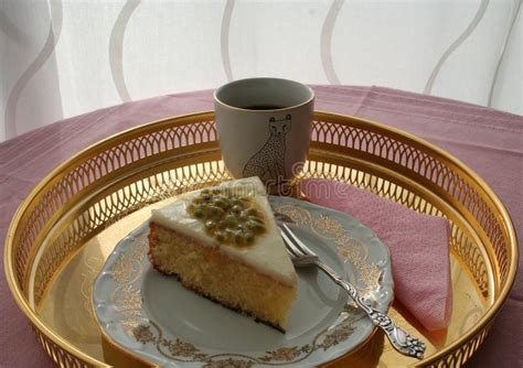 cake with lemon glazing and passion fruit on top stock