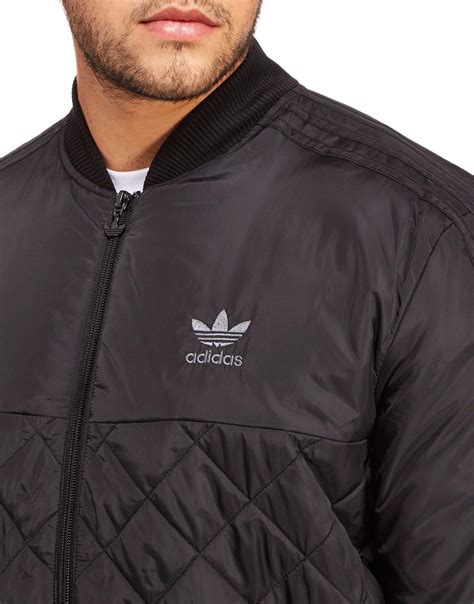 adidas originals synthetic quilt bomber jacket  black  men lyst