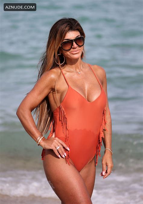 teresa giudice in a peach one piece swimsuit as she takes