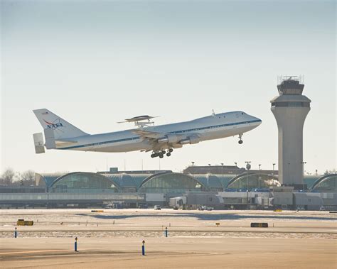 midwest boeing phantom ray departs lambert airport  test flight atop nasa