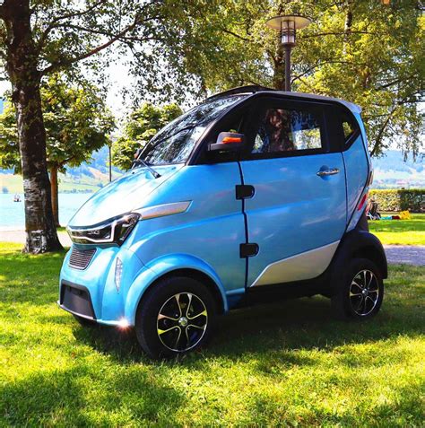 city street  seater electric car  closed cabin china electric vehicle  mobility