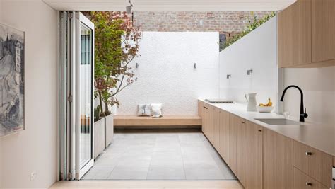 Worktop Extends From Kitchen To Garden In Sydney Residence By Benn