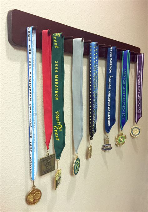 sports medals display holder  peg  wide single row rounded