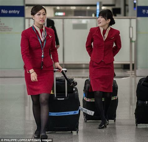 cathay pacific stewardesses complain new uniform is too sexy daily