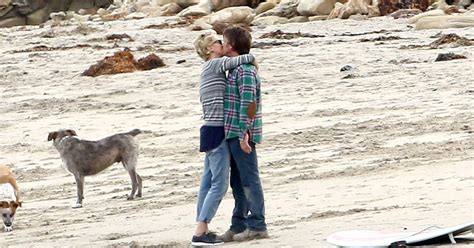 charlize theron sean penn make out on the beach see the