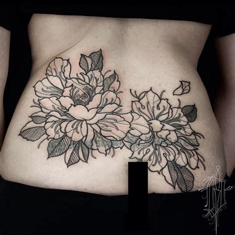 50 Gorgeous Lower Back Tattoos That Look Sexy Too