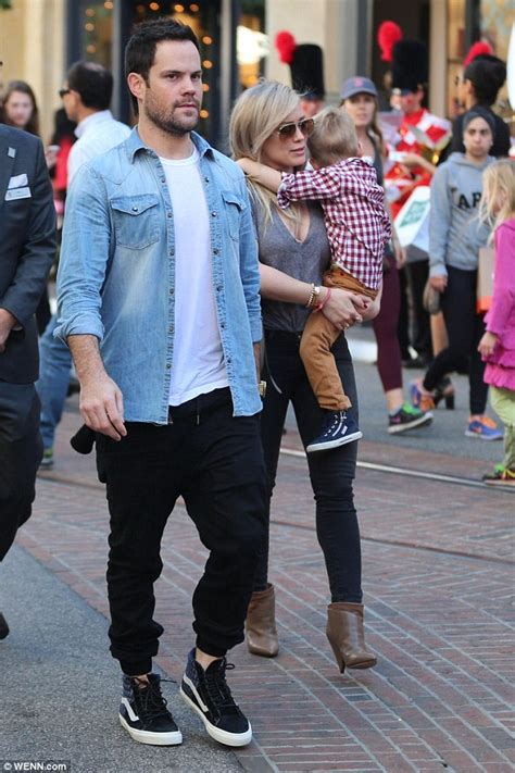 hilary duff with estranged husband mike comrie as they