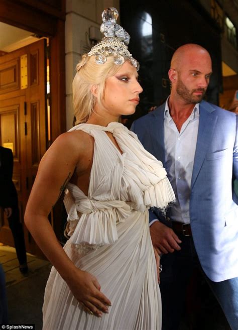 lady gaga leaves athens in leather hotpants after fly posting advert