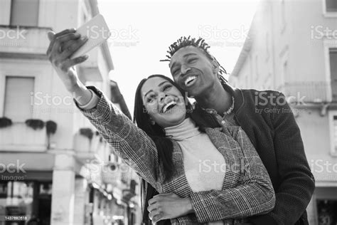 African Couple Having Fun Doing Selfie Outdoor In The City Main Focus
