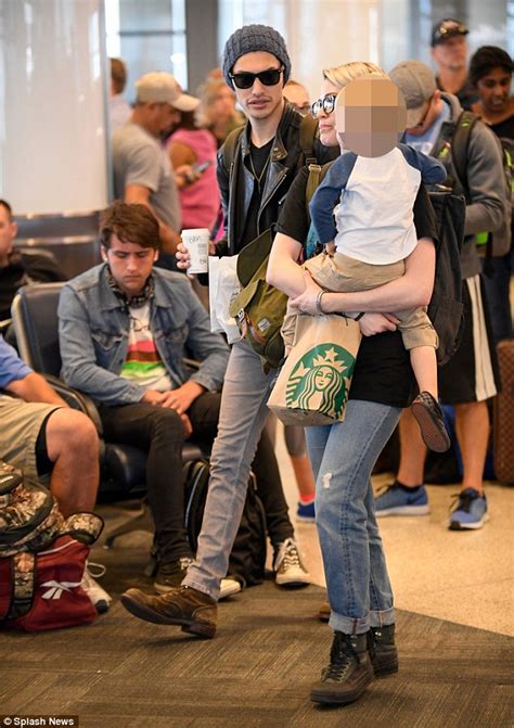 Evan Rachel Wood Cradles Her Son As She Jets Out Of Lax