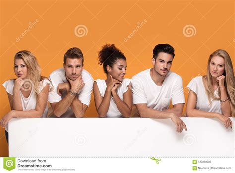 people posing  white empty board stock image image  friends ladies