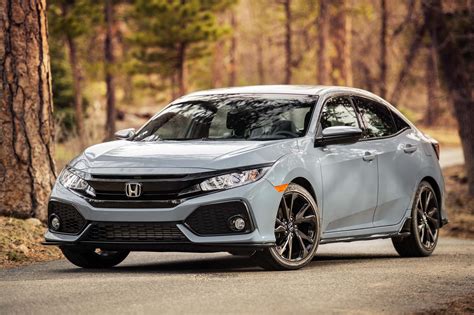 honda civic hatchback sport front  quarter motor trend en