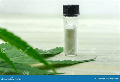 cbd cannabidiol crystals isolate  glass container stock photo image  isolated medicine