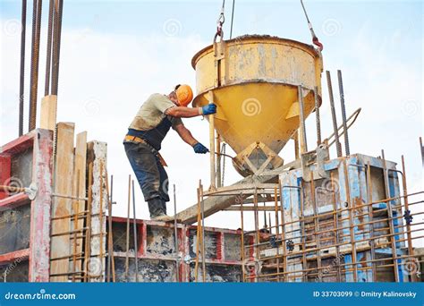 building workers pouring concrete  barrel stock image image  falsework helmet