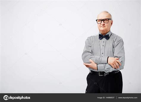 man standing  folded hands stock photo  pressmaster