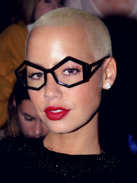 amber rose brings a feminine touch to her blond shaved head amber rose fashion eye glasses