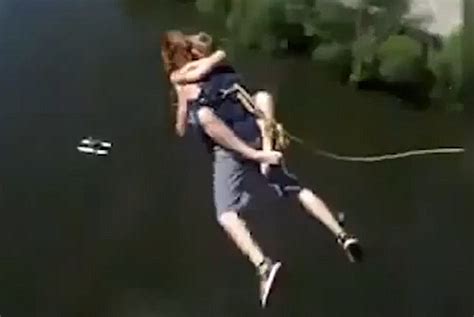 terrifying moment woman bungee jumps off a bridge without a harness
