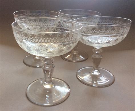 a set of four edwardian champagne coupe glasses 453877