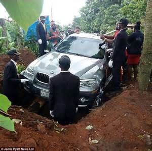 son ‘buries his father in a brand new £66 000 bmw in nigeria daily mail online