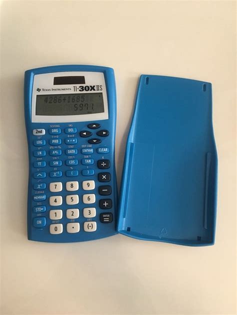 good condition blue calculator    minor scratches