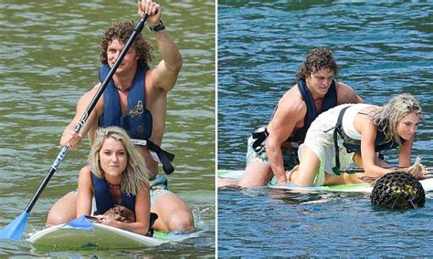 bachelor nick cummins awkwardly straddles blonde on paddleboard daily mail online