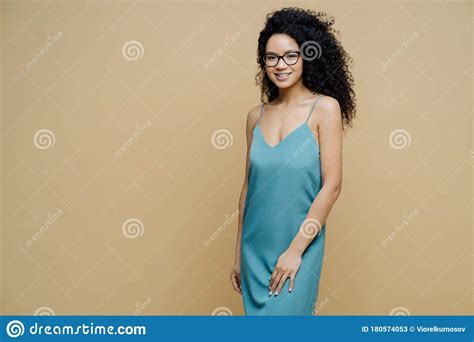 Elegant Beautiful Dark Skinned Woman With Afro Hair Slim Figure Wears