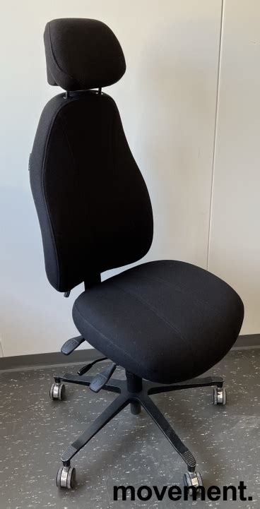 kontorstol fra malmstolen modell  isort stoff med hoy rygg og nakkepute pent brukt