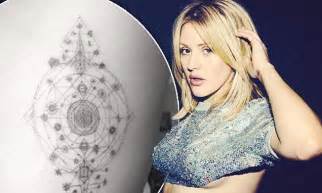 ellie goulding goes under the needle again as she shows off intricate new tattoo daily mail online