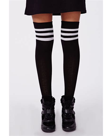 missguided donata striped knee high socks in black lyst