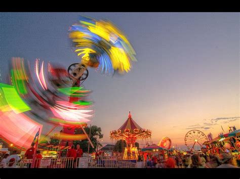 amusement park  night  people   rides  carnival rides   background