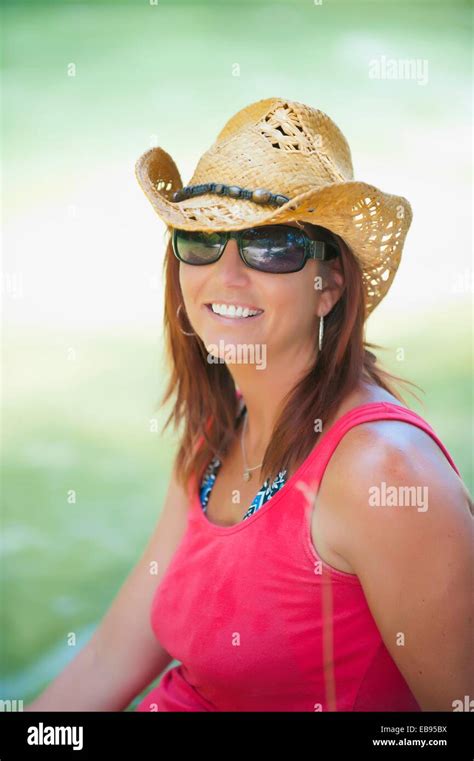 Portrait Of Mature Female 45 Years Old Caucasian Wearing Sunglasses