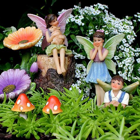 miniature fairy figurines and flower stump supplies pretmanns