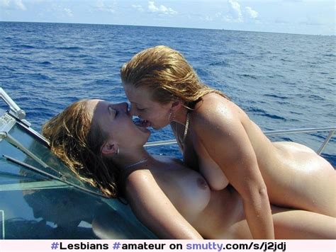 amateur lesbian amateurlesbian kissing outdoor boat ocean