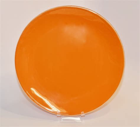 10 Round Orange Glass Plate Bent