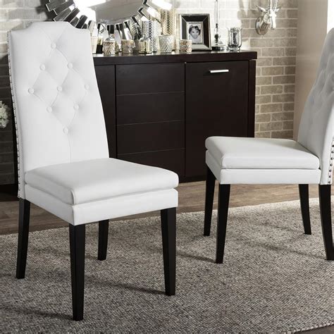 baxton studio dylin white faux leather upholstered dining chairs set