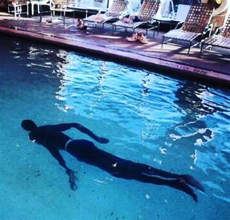 nba player manute bol   swimming pool roddlyterrifying