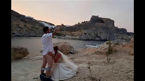 married in style british bride appears to perform sex act on husband in cheeky wedding photo