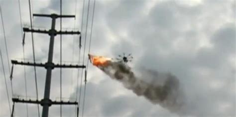 viral video china utility  flame throwing drone  clean power lines