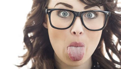 Close Up Woman Sticking Her Tongue Out Isolated On White Funny Girl