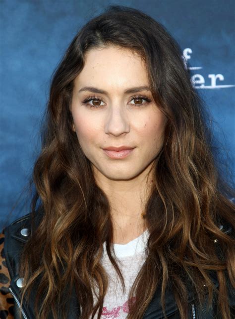 pretty little liar troian bellisario was not okay with one of her show s tweets hellogiggles