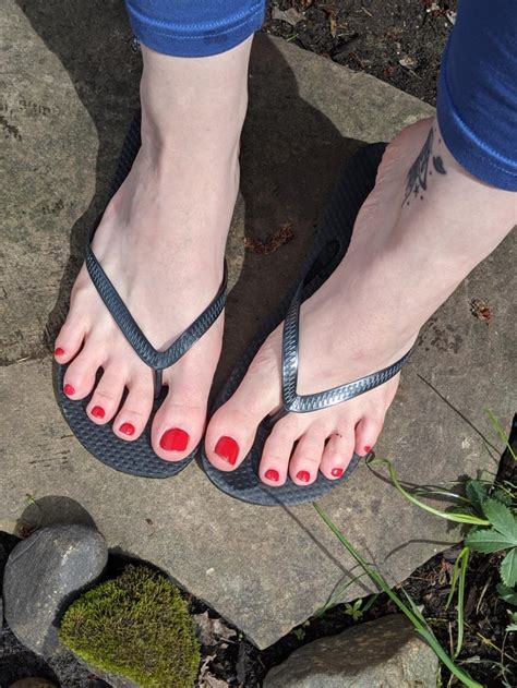 wife s gorgeous feet in flip flops and yoga pants