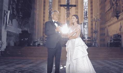 andrea bocelli sings in church on a video and his