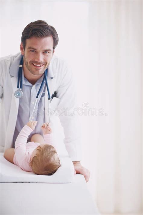 He Loves Working With His Tiny Patients Portrait Of A Male Doctor