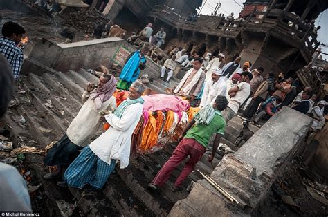 incredible pictures of the funeral fires which line the ganges daily