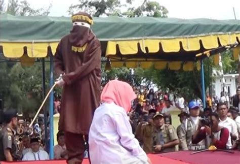 aceh an elderly christian woman has been caned in aceh for selling alcohol the first time