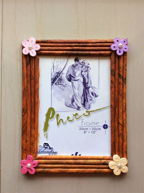 photo frame   newspaper  decorated  quilling newspaper