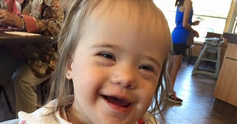 stranger congratulates mom on daughter with down syndrome popsugar moms