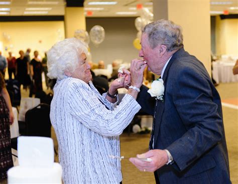 wonderful and fun older couple at their surprise 60th